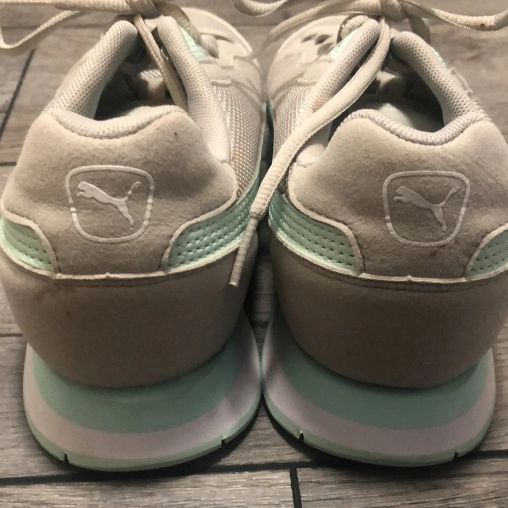 Puma retro runner sneakers in mint and light grey with soft foam support inserts